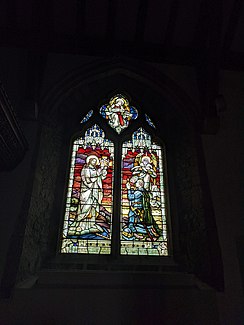 Stained-glass window depicting Revelation 2:10. StNicholasGlass.jpg