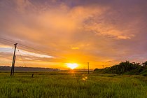 Sonnenaufgang über dem Pullu Padam mit morgendlichem Nieselregen.jpg