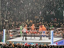 Rollins (extreme right) and Cody Rhodes face to face with The Rock and Roman Reigns at WrestleMania XL in April 2024. The Rock and Roman reigns and Seth Rollins at WMXL.jpg