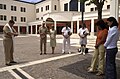 US Navy 050714-N-9580K-001 Navy Chaplain Dave McBeth, left, leads an informal gathering of personnel aboard Naval Support Activity (NSA) Naples during a Europe-wide coordinated two-minute moment of silence.jpg