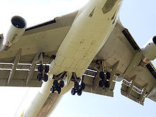 Krueger flaps deployed from the leading edge of a Boeing 747 (top left and right in photo