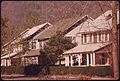VIEW OF MINE SUPERVISORS' HOUSING IN A COAL COMPANY TOWN NEAR LOGAN, WEST VIRGINIA. THEY ARE ACROSS THE ROAD FROM THE... - NARA - 556433.jpg