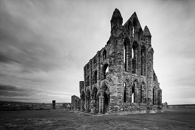 Ruins of Whitby Abbey in Whitby. As a creature resembling a large dog which came ashore at the Whitby headland, Count Dracula runs up the 199 steps to