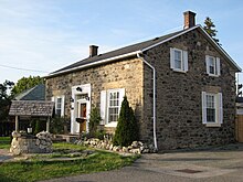 Built in 1857, the William Devenish House is an example of a 19th century residence in Clairlea.