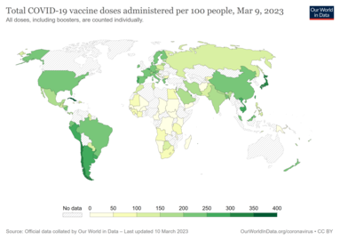 COVID-19 vaccine doses administered per 100 people by country. See date on map.