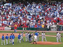 Cubs and fans celebrate the 2007 National League Central Championship. Cubs Win flags abound. 20070928 Cubs celebrate victory and fans show Cubs Win flags.jpg
