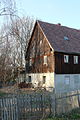 Deutsch: Cunnewitzer Straße 18 in Lautitz: Wohnhaus (Obergeschoss Fachwerk), ohne Anbau; Fachwerk im Obergeschoss und Giebel verbrettert, Relikt ländlicher Holzbauweise, baugeschichtlich und straßenbildprägend von Bedeutung