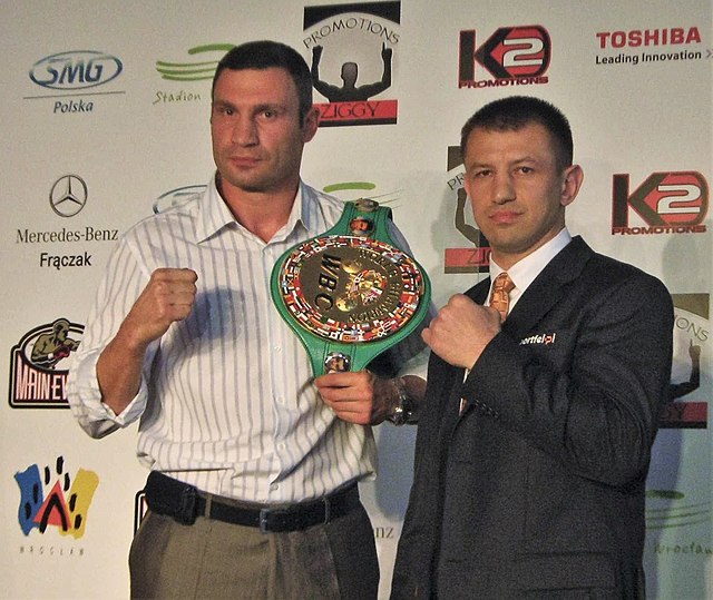 Klitschko and Adamek, during signing for the fight in 2011