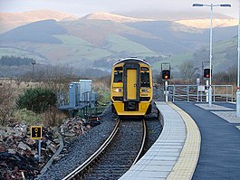 Vlak Arriva Wales vjíždí do železniční stanice Dovey Junction - geograph.org.uk - 1087576.jpg