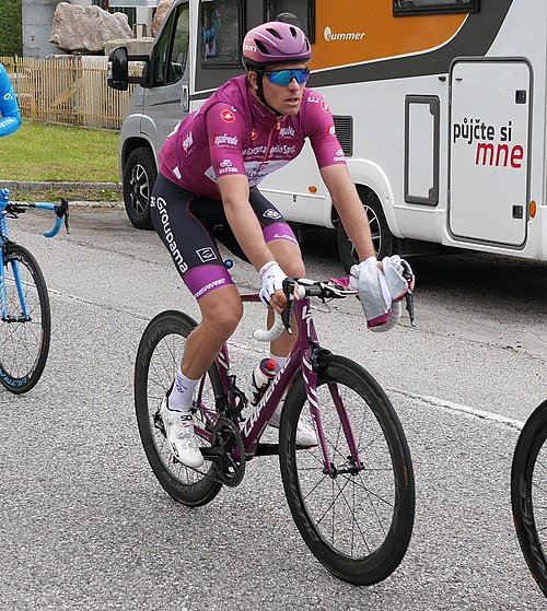 Arnaud Démare (Groupama–FDJ) (pictured during stage 18) wore the cyclamen jersey as points leader for seven stages and eventually finished in second p