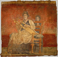 Wall fresco of a seated woman with a kithara, 40-30 BC, from the Villa Boscoreale of P. Fannius Synistor; Late Roman Republic, but most likely representing Berenice II of Ptolemaic Egypt wearing a stephane (i.e. royal diadem) on her head Boscoreale1.jpg