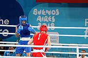 Deutsch: Boxen bei den Olympischen Jugendspielen 2018 Tag 12, 18. Oktober 2018 - Kampf um die Bronzemedaille im Fliegengewicht Mädchen – Timur Merjanow (Usbekistan, rot) schlägt Youssef Ali Karar Ali (Ägypten, blau) 5-0; Ringrichter ist Antonín Gaspar (Tschechien). English: Boxing at the 2018 Summer Youth Olympics on 18 October 2018 – Boy's heavyweight Bronze Medal Bout - Timur Merjanov (Uzbekistan, red) beats Youssef Ali Karar Ali (Egypt, blue) 5-0; Referee is Antonín Gaspar (Czech Republic). Español: Boxeo en los Juegos Olímpicos Juveniles de Verano de 2018 en 18 de octubre de 2018 - Medalla de bronce de peso pesado del muchacho: Timur Merjanov (Uzbekistán, roja) le gana a Youssef Ali Karar Ali (Egipto, azul) 5-0; El árbitro es Antonín Gaspar (Republica checa).