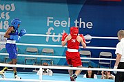 Deutsch: Boxen bei den Olympischen Jugendspielen 2018 Tag 12, 18. Oktober 2018 - Finale Leichtgewicht Mädchen – Junioren-Weltmeisterin und dreifache Juniorinnen-Europameisterin Caroline Sara DuBois (Großbritannien, blau) schlägt Juniorinnen-Asienmeisterin Porntip Buapa (Thailand, rot). English: Boxing at the 2018 Summer Youth Olympics on 18 October 2018 – Girls' lightweight Gold Medal Bout – Caroline Sara DuBois (Grat Britain, blue) wins over Porntip Buapa (Thailand, red). Español: Boxeo en los Juegos Olímpicos Juveniles de Verano de 2018 en 18 de octubre de 2018 - Combate de medalla de oro de peso ligero para niñas - Caroline Sara DuBois (Gran Bretaña, azul ) gana sobre Porntip Buapa (Tailandia, rojo).