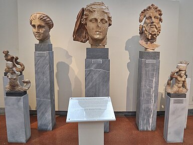 The Despoina Pantheon, arranged at the NAMA in 2018. CULT STATUES IN THE TEMPLE OF DESPOINA AT LYKOSOURA (2nd cent. B.C.) in the National Archaeological Museum of Athens on 27 March 2018.jpg