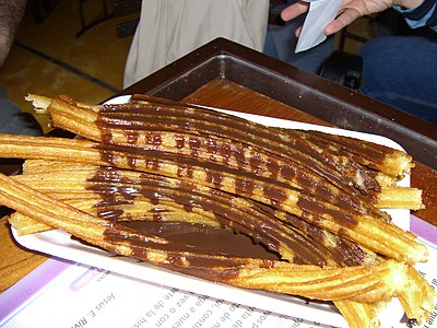 Churros drizzled with chocolate