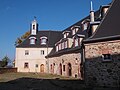 The Döben manor as a whole, with the individual monuments: former brewery (No. 1c) and garden pavilion (see individual monuments - Obj. 09304151) and as a whole as a whole: the basement and foundation walls of the castle and the former farm buildings, fencing, courtyard paving, driveway and basins and the garden parts of the pleasure garden and kitchen garden