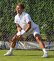 Enzo Couacaud competing in the first round of the 2015 Wimbledon Qualifying Tournament at the Bank of England Sports Grounds in Roehampton, England. The winners of three rounds of competition qualify for the main draw of Wimbledon the following week.