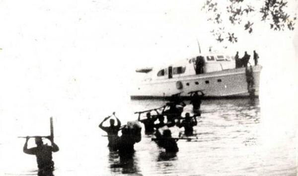 Cuban guerrillas disembarking after the Landing of the Granma