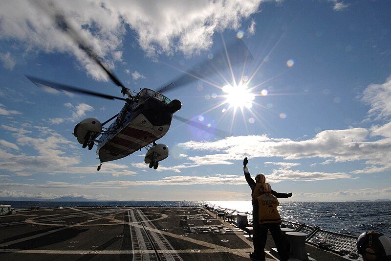 File:Flickr - Official U.S. Navy Imagery - A Sailor communicates to the pilots of a Royal British navy helicopter..jpg