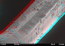 Filament of a 50-watt incandescent lightbulb in an SEM in stereoscopic mode, presented as an anaglyph image. 3D red cyan glasses are recommended to view this image correctly. Fused Electrical Filament SEM Stereo 500x.JPG