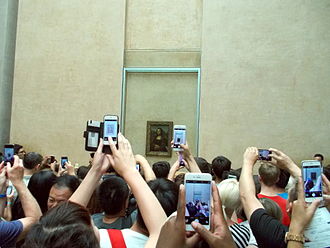 A crowd at the Mona Lisa in the Louvre in Paris Gioconda Louvre photographers.jpg