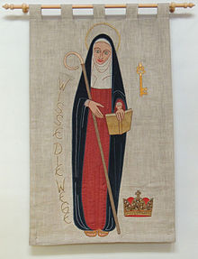 Wandbehang mit einer Darstellung der hl. Hildegard in der Heilig-Geist-Kirche in Frankfurt-Riederwald