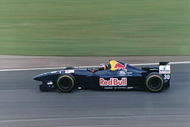 Heinz-Harald Frentzen driving the C14 at the 1995 British Grand Prix.