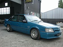 A slightly modified 1985 VK Commodore SS Group A sedan in Formula Blue. This model is nicknamed Blue Meanie by enthusiasts. Holden Commodore SS Group 3 (1984-1986 VK series).jpg
