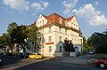 Apartment building in half-open development