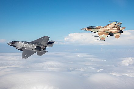 The F-35I Adir (accompanied by a 253 Squadron F-16I Sufa) on its debut flight in Israel, December 2016