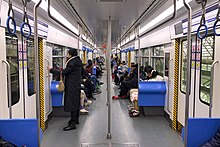 Interior of a Line 3 train showing an open gangway design Interior of 030683 (20191224110551).jpg