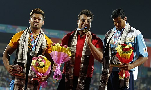 Left-right: Irfan, Haddadi, Gowda Iranian Eshan Hadadi, The Gold Medalist, Malaysia's Silver Medalist Muhammed Irfan And Bronze Winner Of India, Vikas Gowda.jpg