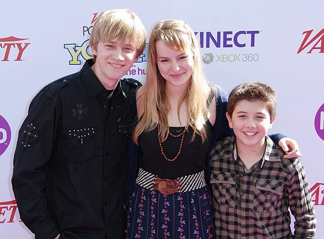 Jason Dolley, Mendler, and Bradley Steven Perry in October 2010