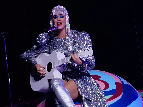 Perry performing an acoustic version of "Thinking of You" during her Witness: The Tour in October 2017.