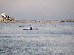 Kayakers in Sunset Bay