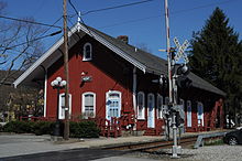 The former station building, now occupied by a pharmacy Kent, CT - train station 02.jpg