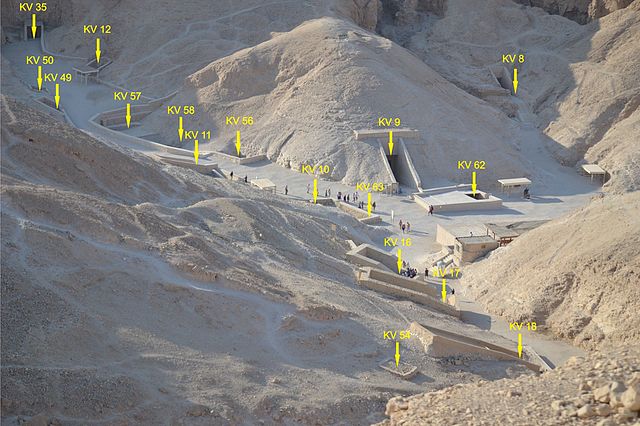 The central portion of the Valley of the Kings in 2012, with tomb entrances labeled. The covered entrance to KV62 is at centre right.