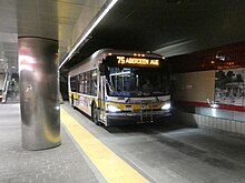 A route 75 bus in the Harvard Bus Tunnel MBTA route 75 bus northbound in the Harvard Bus Tunnel, March 2022.JPG