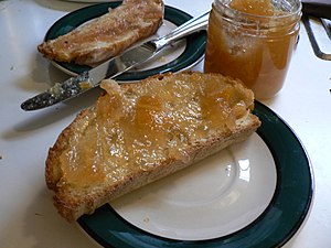 Marmalade spread on bread.jpg