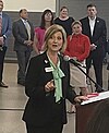 Mary K. O'Brien speaking at a fundraiser for Deb Conroy.jpg