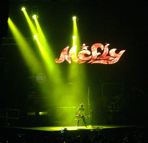 Tom Fletcher of McFly performs onstage at Nottingham Arena during McFly's Motion in the Ocean Tour in 2006.