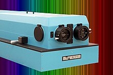 McPherson 4m focal length high resolution spectrometer shown over example of false color Xenon spectrum. McPherson 2062 Spectrometer.jpg