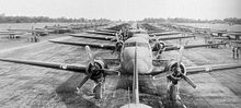 436th Troop Carrier Group Douglas C-47s and CG-4A Waco Gliders lined up on the runway at Membury Airfield, September 1944, prior to deployment to the Netherlands during Operation Market-Garden Memb-436tcg-2.jpg