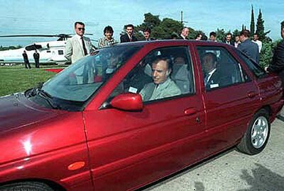 President Carlos Menem driving an Escort model in October 1996, during the ceremony in which the model was released in Argentina