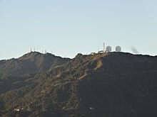 Twin peaks of Mount Cabuyao (right, foreground) and the higher Mount Santo Tomas (left, background) Mt. Santo Tomas and Mt. Cabuyao (Tuba), with towers and big dishes (Baguio, Benguet)(2018-11-27).jpg