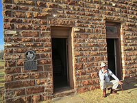 Work is proceeding in 2011 on the restoration of the old Matador jail. Pictured is former Motley County Judge Ed D. Smith. Old jail, Matador, TX IMG 1564.JPG