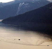 The image was taken on March 29, 2007, from Grouse Mountain, Idaho, by The River Journal's staff photographer, Jay Mock. Pend Oreille Paddler.webp