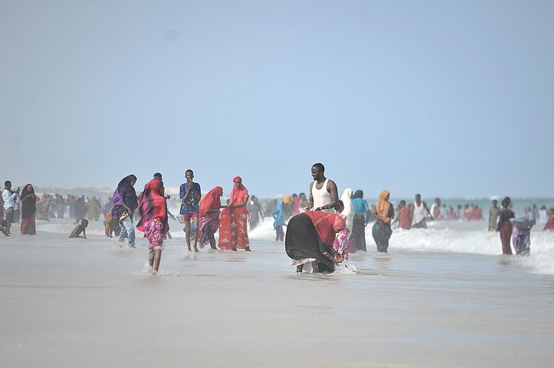 File:People play in the ocean on Lido beach in Mogadishu, Somalia, during Eid al-Fitr on July 28. AMISOM Photo - Tobin Jones (14581419187).jpg