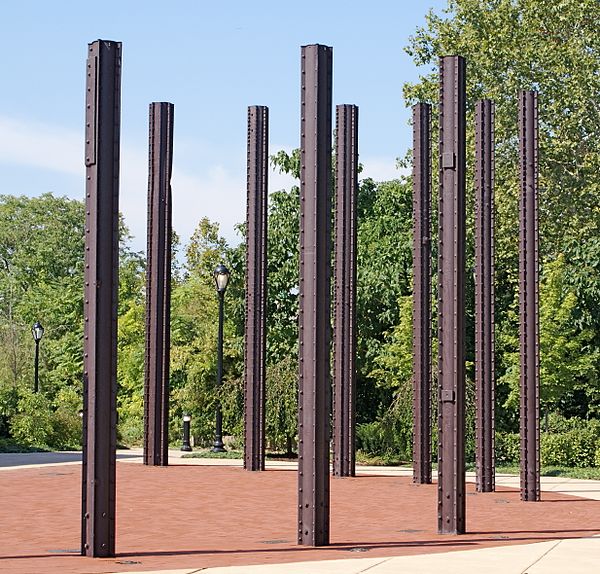 An arc of Phoenix Columns adorns a plaza outside the old foundry building.