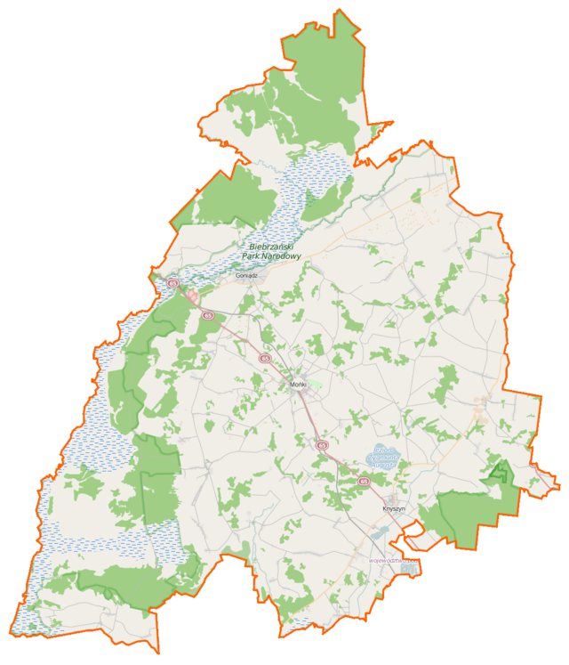 Mapa konturowa powiatu monieckiego, w centrum znajduje się punkt z opisem „Mońki”